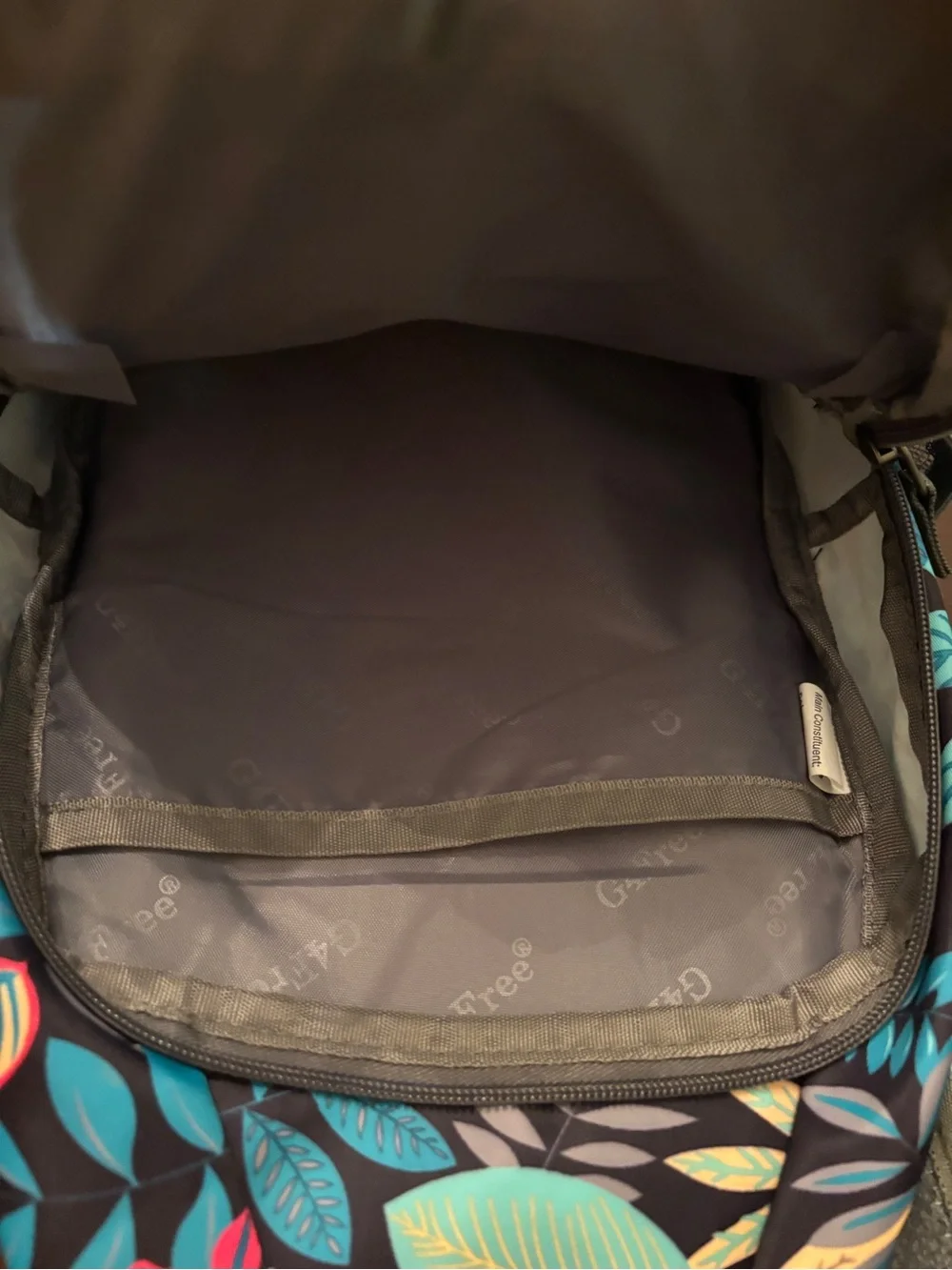 lug Navy Sling Backpack with Teal, Yellow, Pink & Cream Leaf Print
